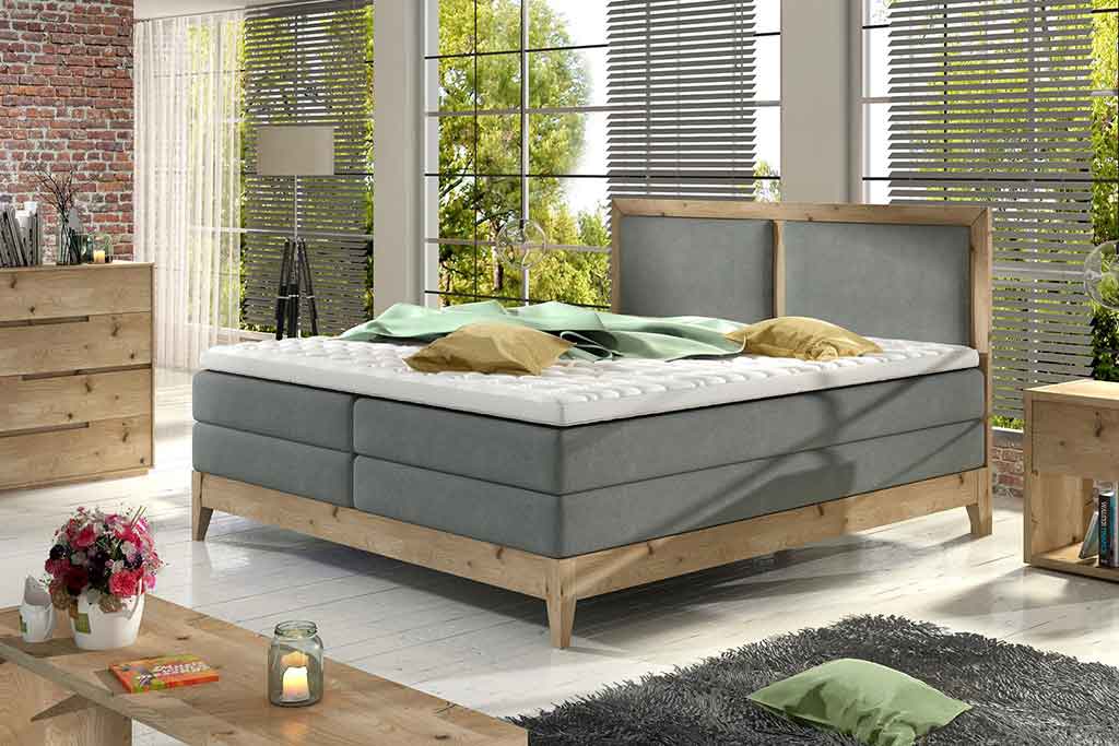 Łóżko na ramach dębowych Marielle , bez pojemnika na pościel. Komfort spania zapewnia system trzech materacy: bonellowy, kieszeniowy oraz nakładki Top.