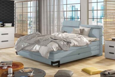 Łóżko ORION z regulowanymi zagłówkami oraz dwoma pojemnikami na pościel. Komfort spania zapewnia system trzech materacy: bonellowy, kieszeniowy i Top